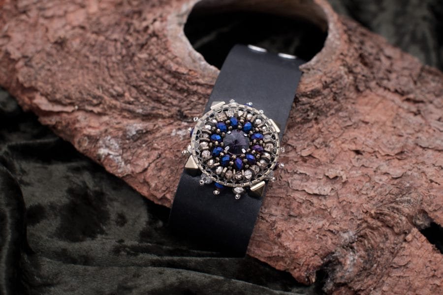 Natural leather bracelet with blue crystals