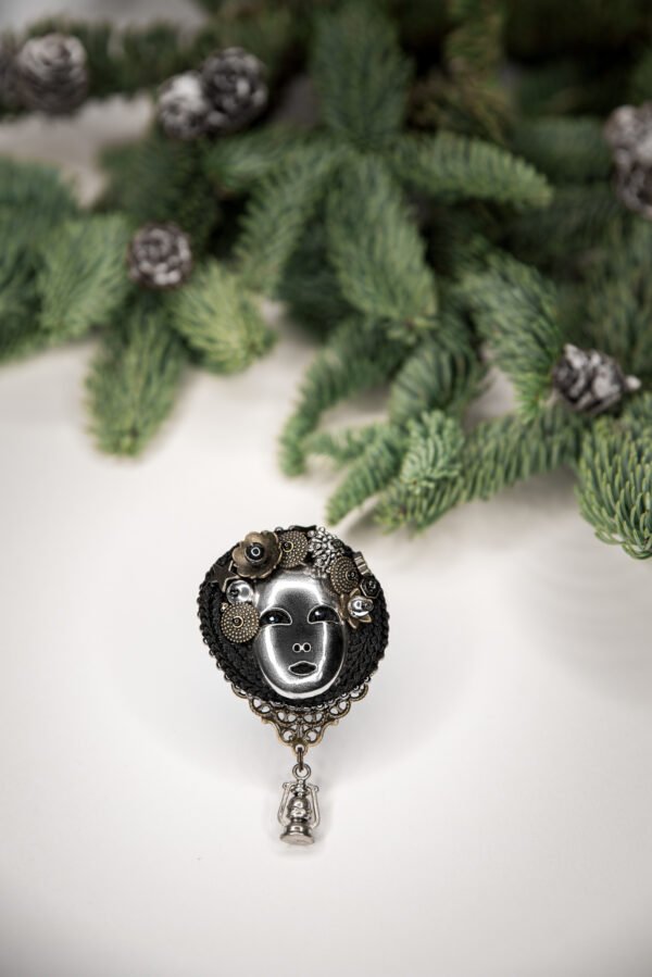 Handmade brooch with woman's face, hematites