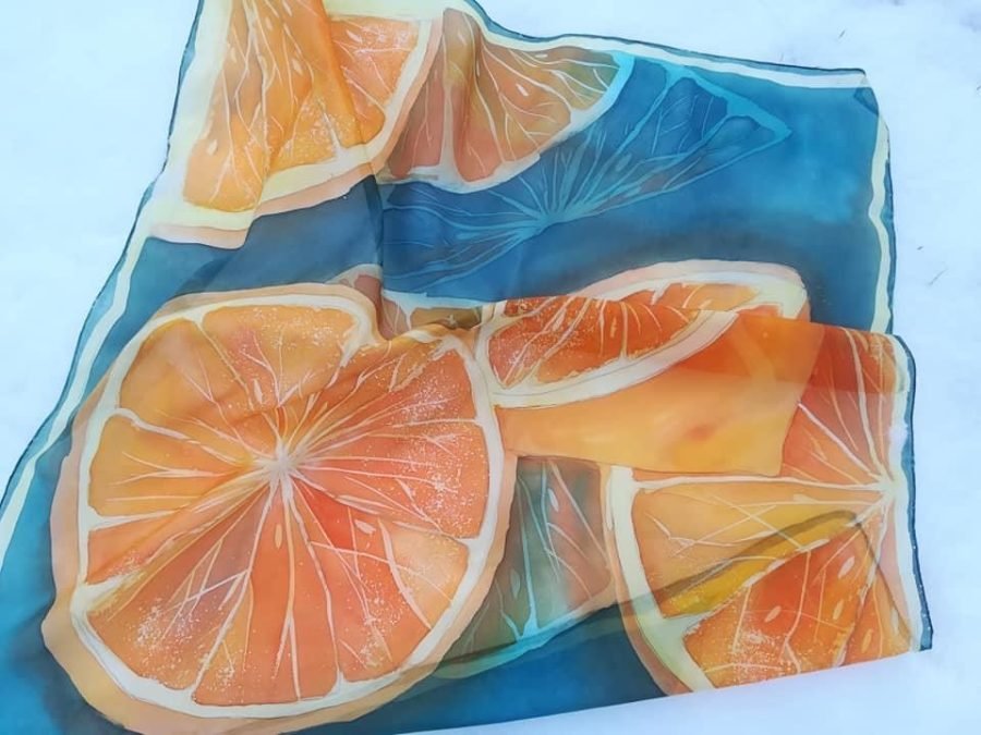 100% silk scarf decorated with orange prints