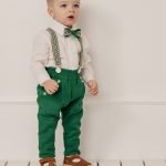 Green linen suit with patterned shoulder straps, bowtie