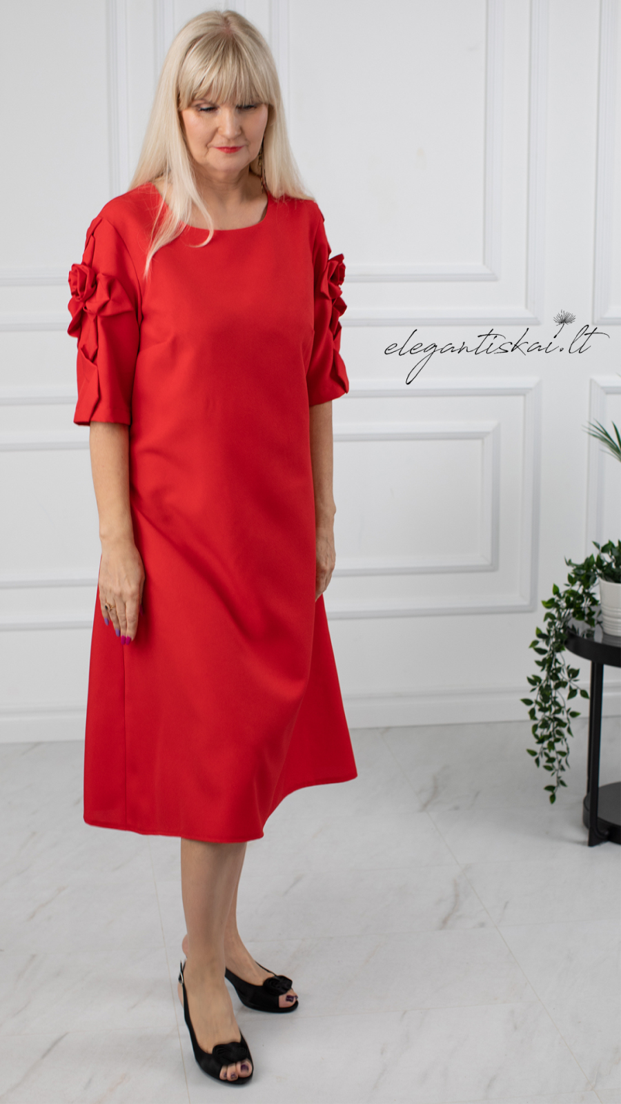 Red ladies' dress with decorative sleeves