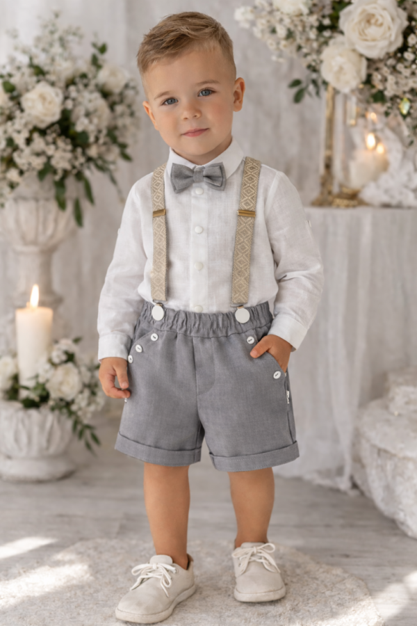 Suit with shorts, patterned shoulder straps and bow tie