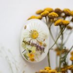 Handmade brooch with meadow flowers