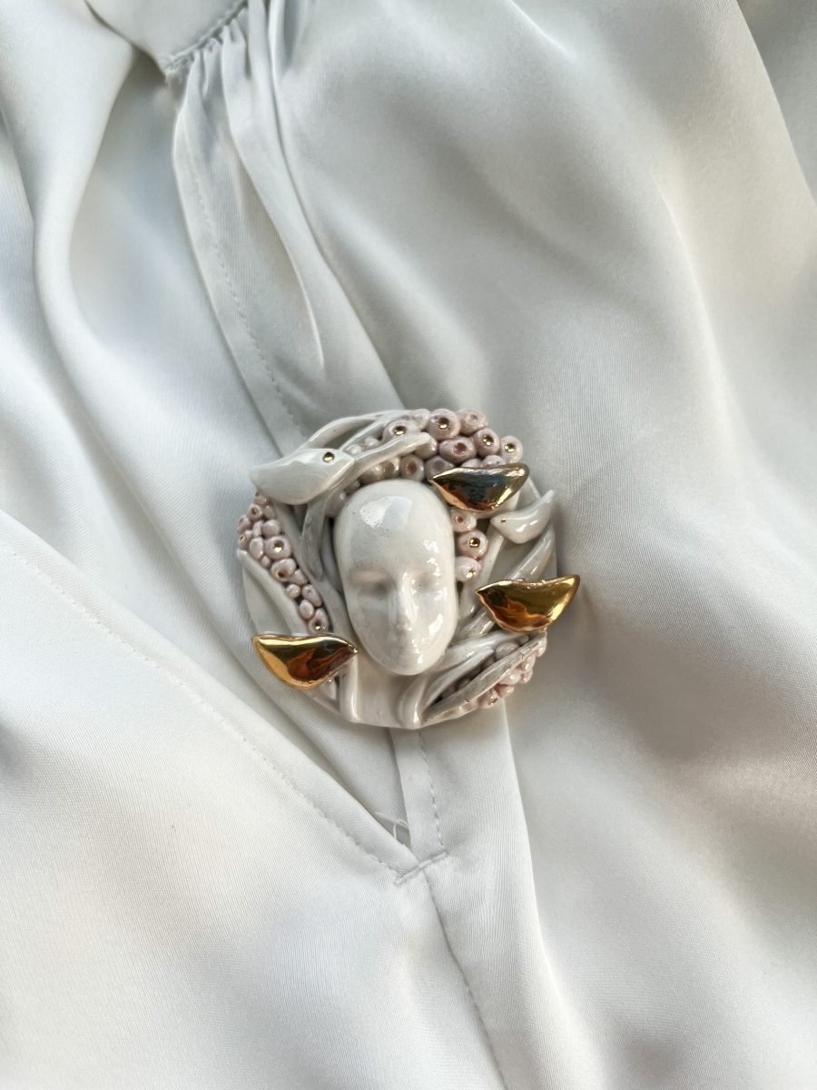 Elegant handmade brooch made of white clay