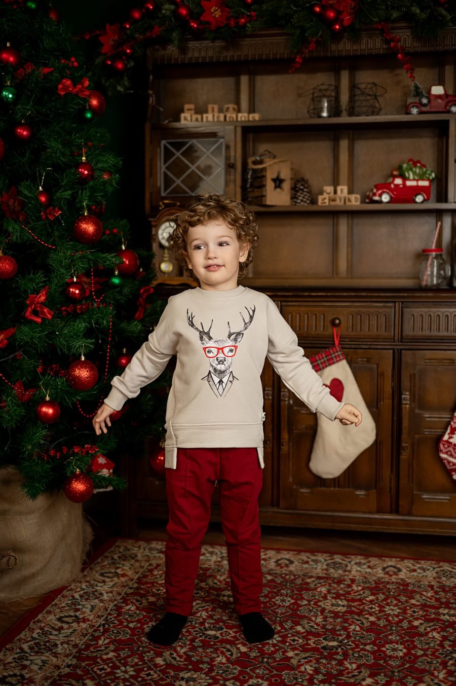 Christmas costume for children with a festive moose