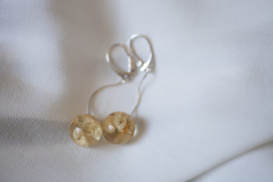 Handmade dangling earrings with flowers