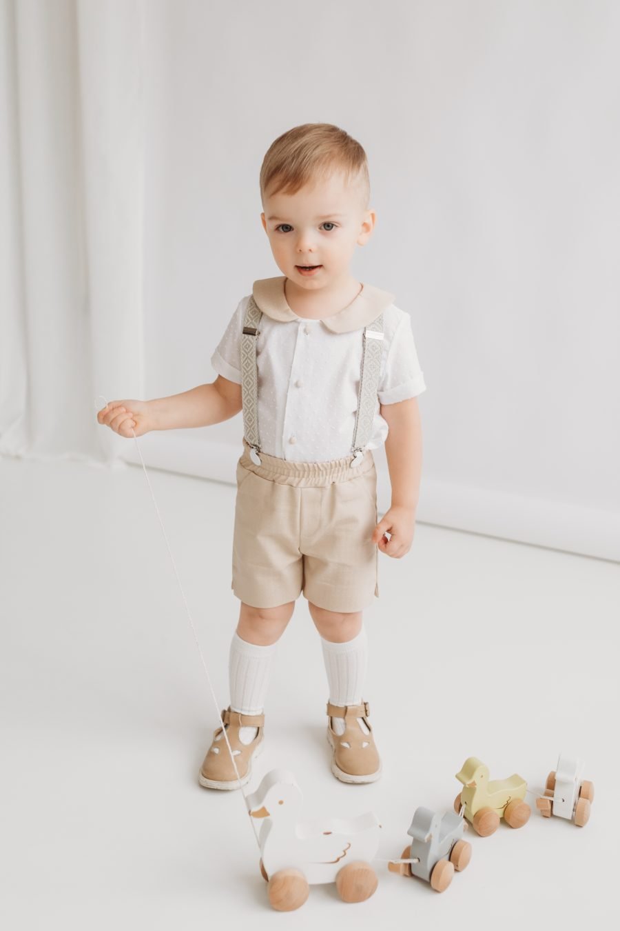 Summer suit with shorts and braces