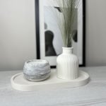 Handmade interior details: tray, vase and candle