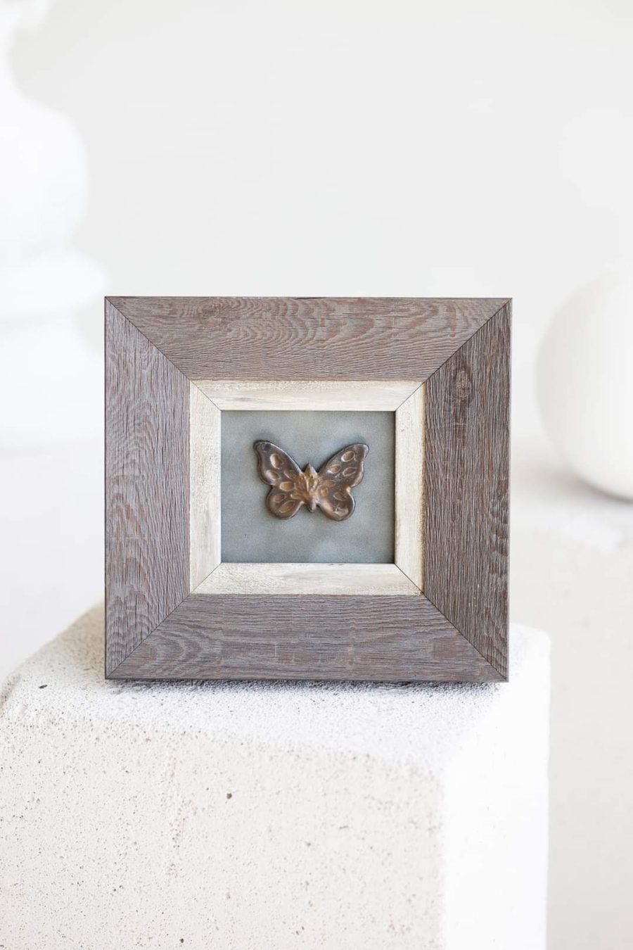 Original ceramic butterfly in wooden frame